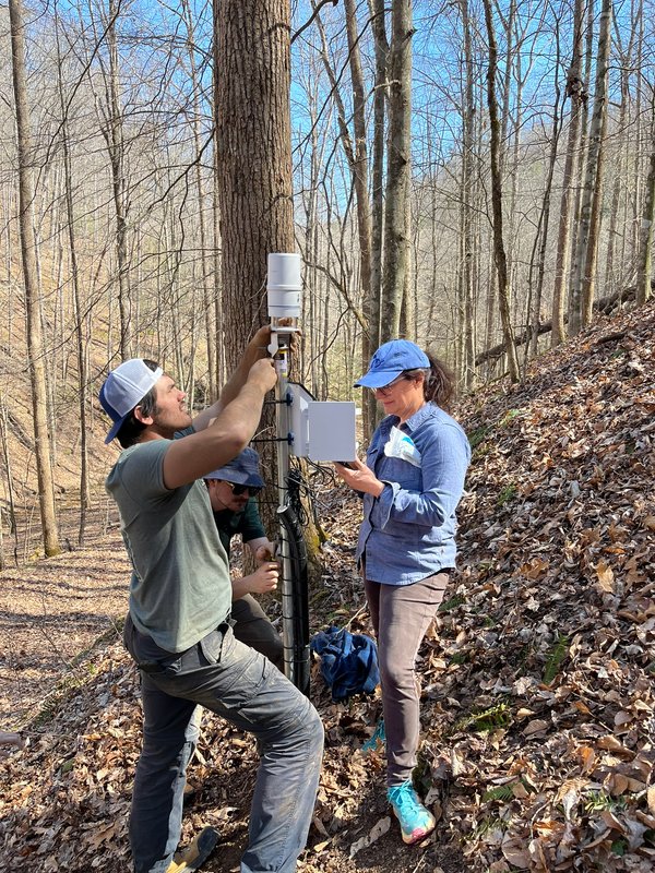 Members of the KGS Landslide Hazards & Engineering Geology Team install a monitoring station in eastern Kentucky.