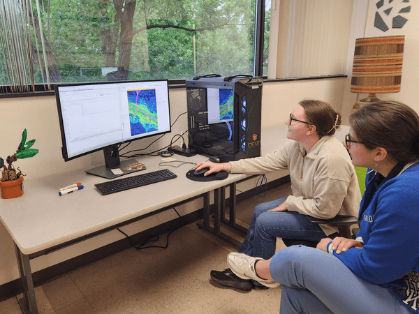 2025 interns working together on flood modelling in the study area.