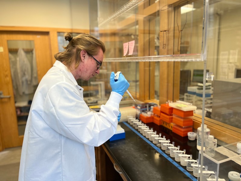 Zach Walton, 2022 Potter Intern turned full-time KGS researcher, conducting lab work.