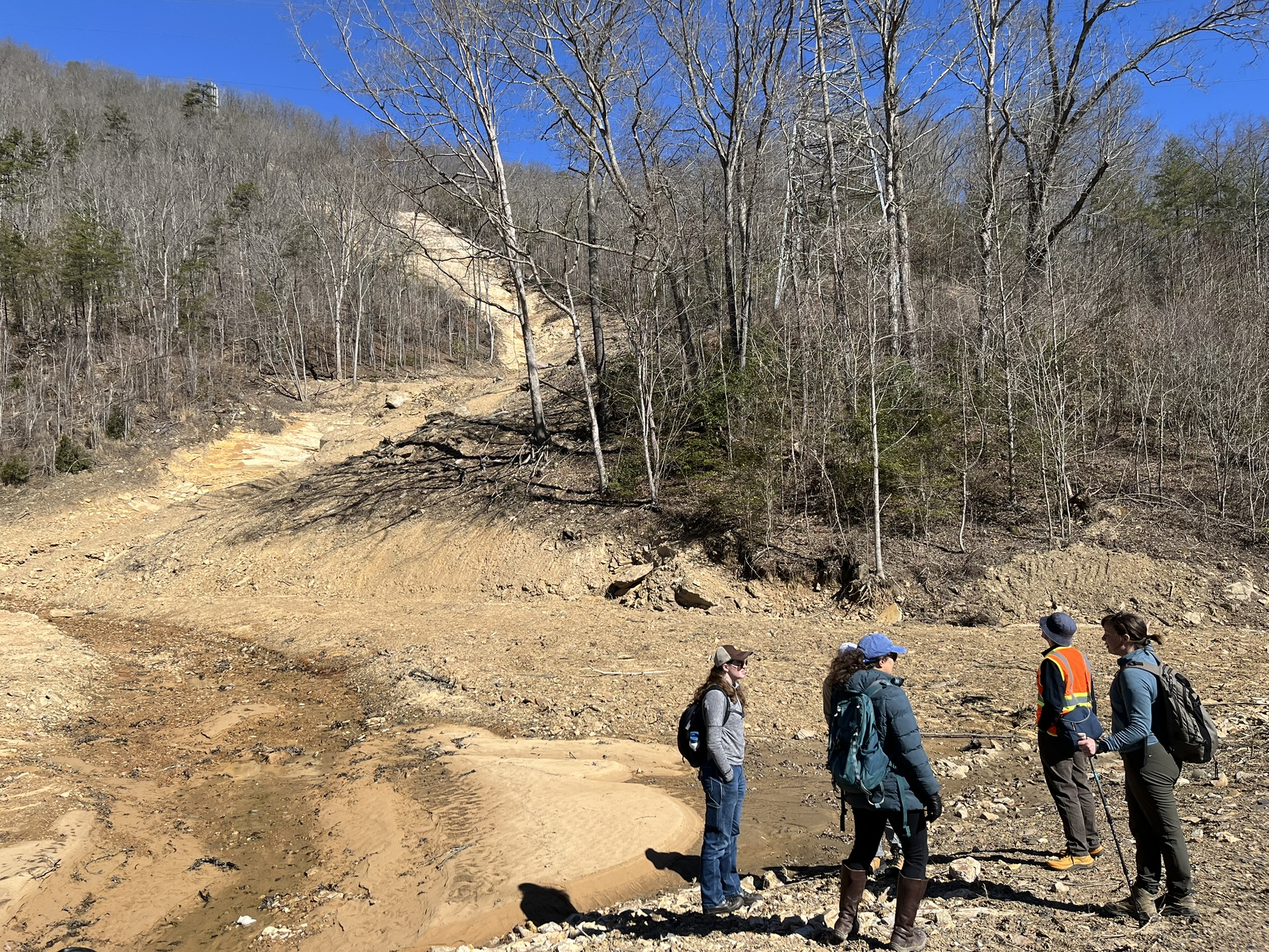 KGS geologists standing at the toe of a long debris flow in Bell County. Photo by Matt Crawford.