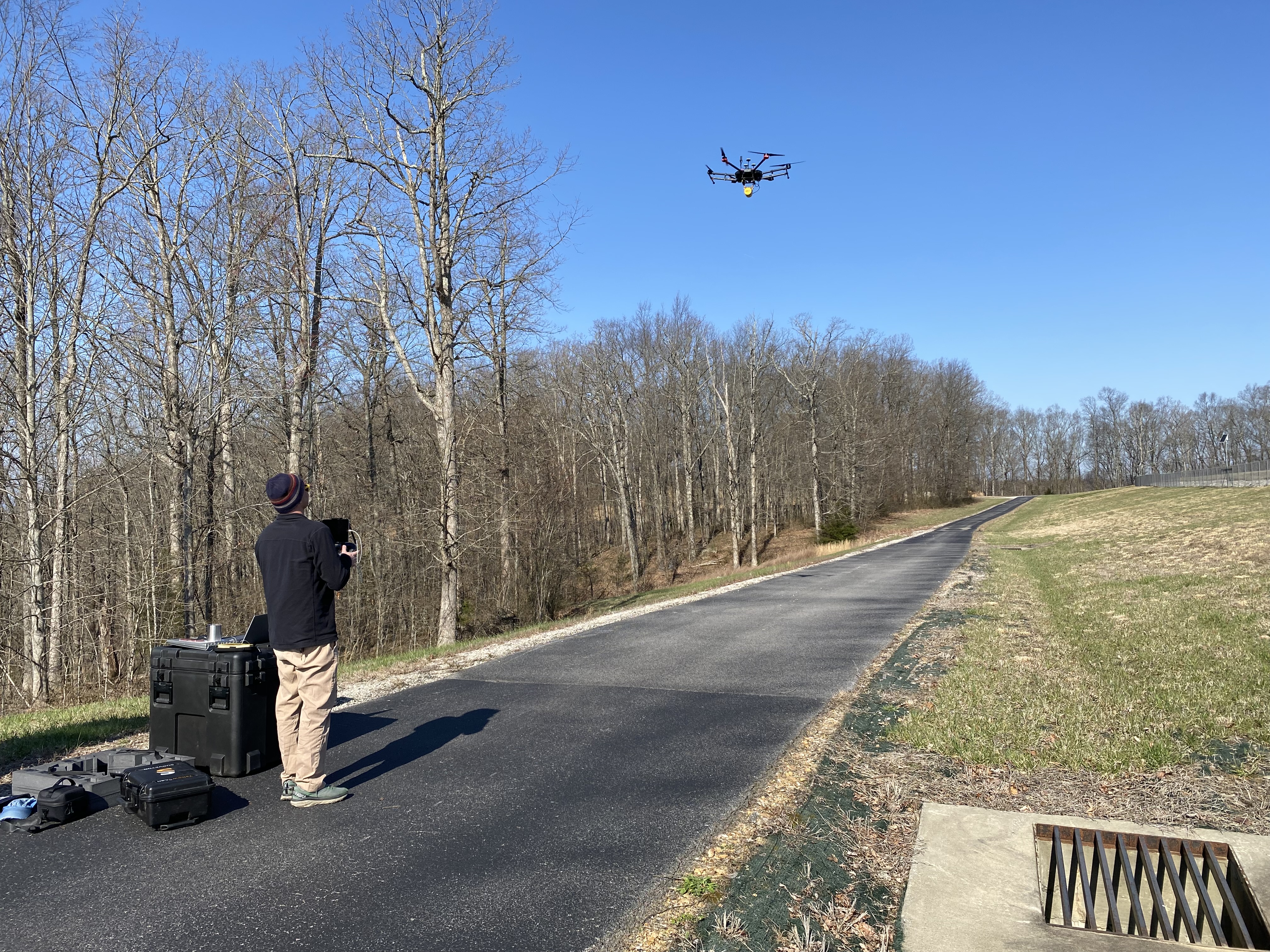 UAV aerial survey of landslide site. Photo by Zhenming Wang.