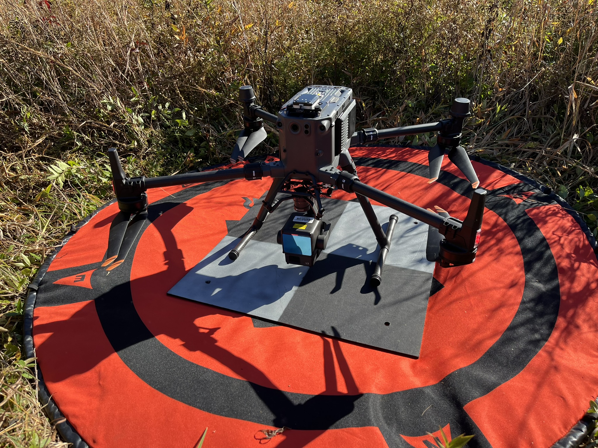 UAV on the ground on top of a landing target. Photo by Matt Crawford.
