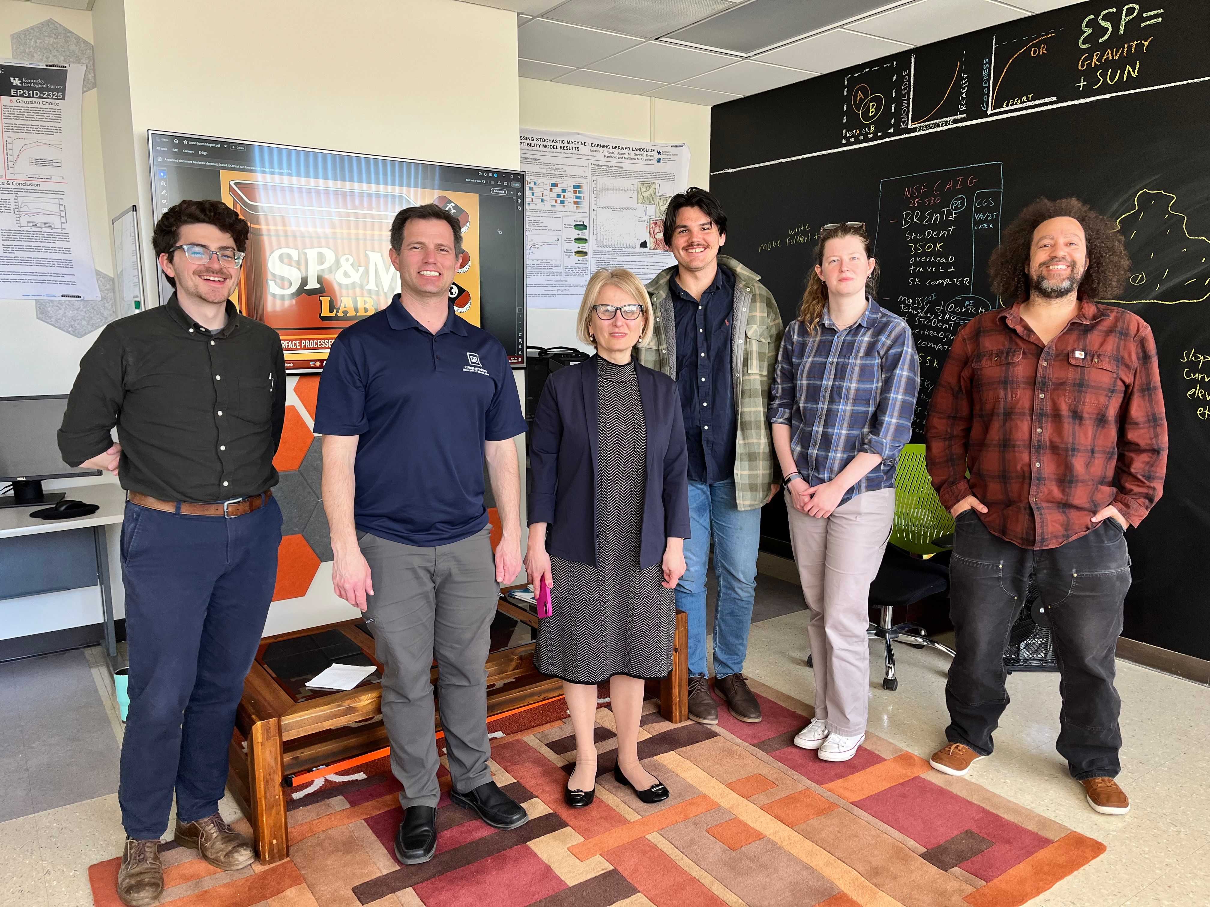 SP&M Lab welcomes visiting scholar Dr. Olena Ivanik, a senior landslide scientist from the University of Kyiv. Pictured here are Hudson Koch (KGS), Dr. Dan Sturmer (University of Cincinnati), Dr. Orena Ivanik (University of Kyiv), Ryan Ramsey (KGS), Evelyn Bibbins (KGS), and Dr. Jason Dortch (KGS).